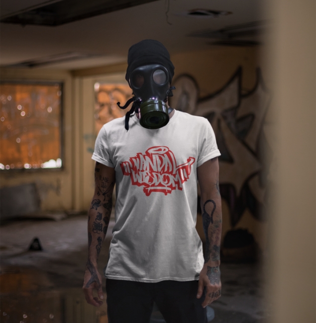 man wearing gas mask and Vandal t-shirt